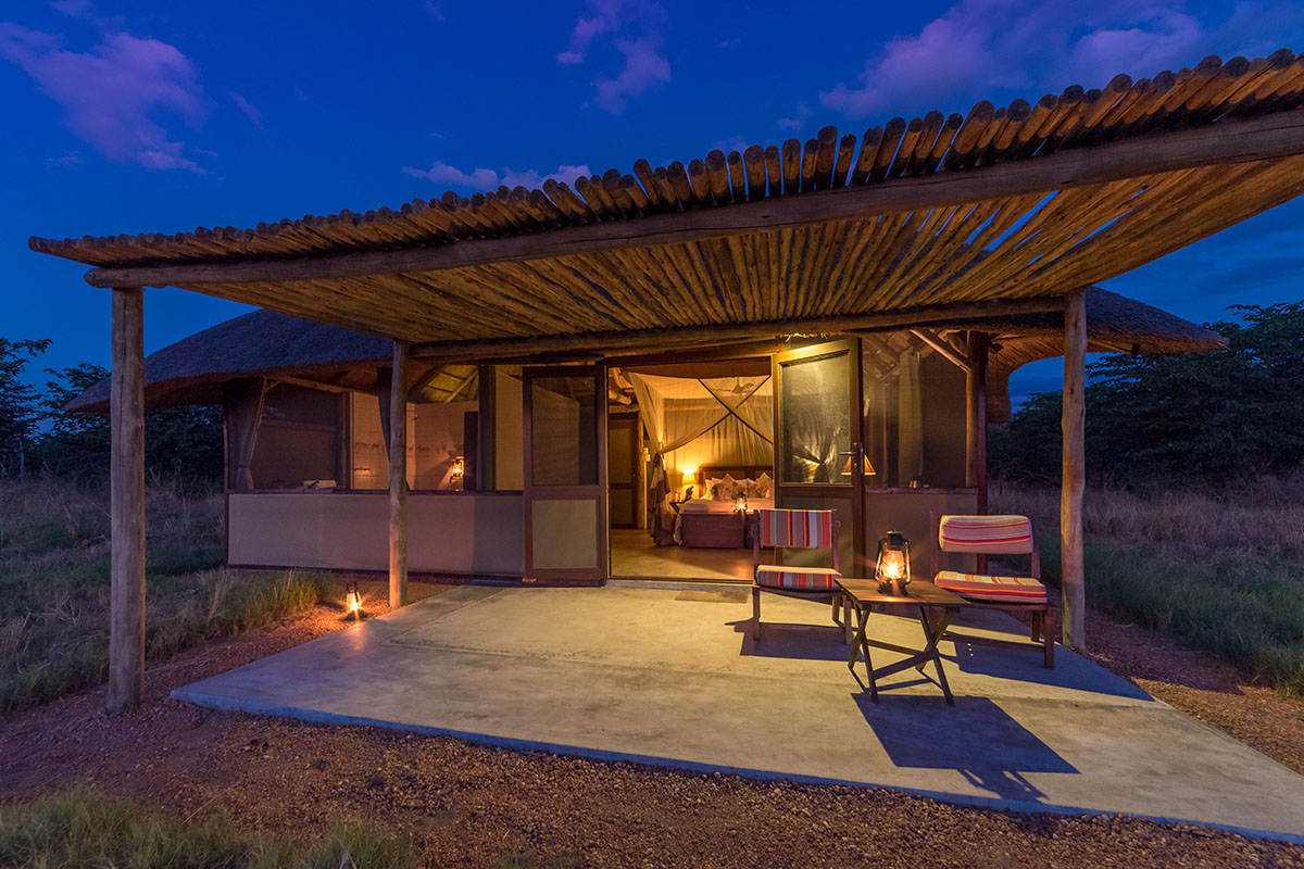 camp hwange hwange-national-park-zimbabwe-lodges-chalet-evening
